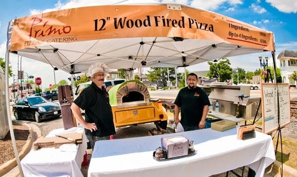 Primo Pizza and Catering staff at an outdoor event